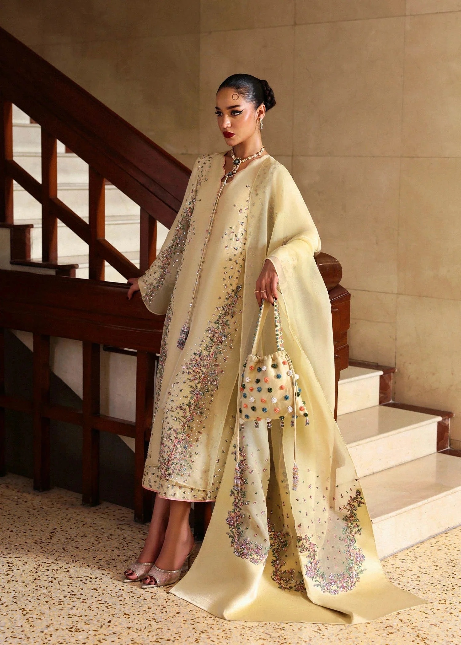 Ciel- Hussain Rehar clothing in yellow, pink tones.